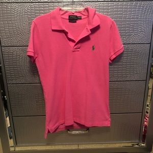 pink polo shirt (green logo)